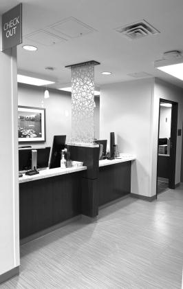 Renovations at the patient checkout desk create a modern and welcoming atmosphere.