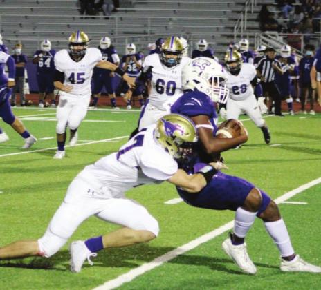 Right: Senior linebacker Mason Neill (47) seemed to be everywhere for the Mustangs’ defensive on Friday against Elgin. The Marble Falls defense struggled to contain the athleticism of the Wildcats early in the game but allowed zero points in the fourth quarter in a comeback win.