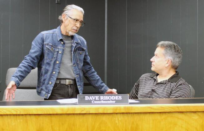During a break, Marble Falls City Councilman Rene Rosales expressed his concerns May 18 about the process of selecting a place 5 appointment with Councilman Craig Magerkurth (seated). Connie Swinney/The Highlander