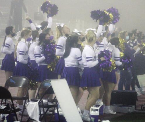 The Marble Falls cheer team, seen here in Brenham during the foggy football playoff game, will compete at the UIL State Spirit Championships on Wednesday, Jan. 13. Nathan Hendrix/The Highlander