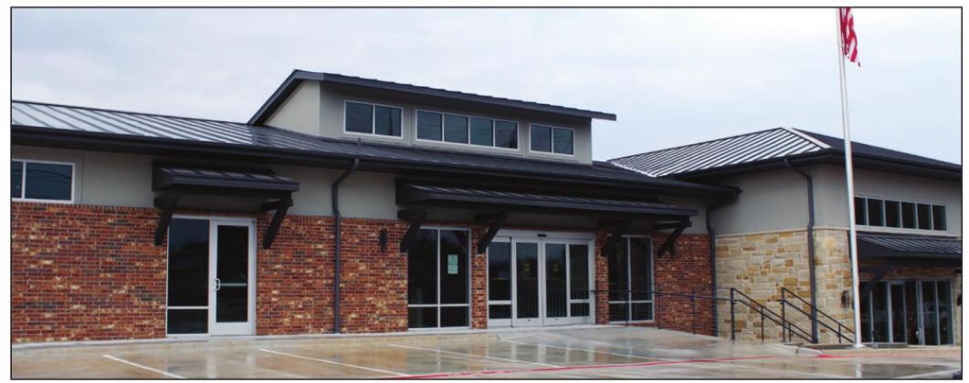 The Helping Center in Marble Falls will move into its new building, 1016 Broadway, on Jan. 4. The new building has more space, a loading dock and a walk-in freezer to help the organization better serve the community. Staff photo