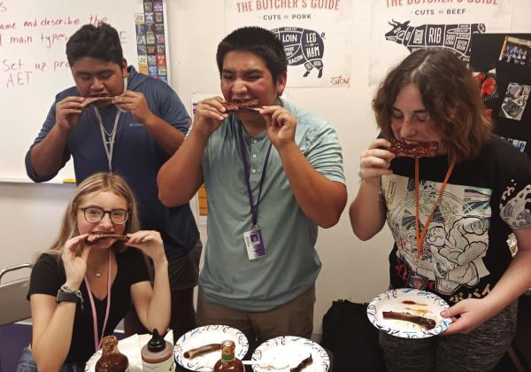 MFISD students Shana Skeen, Logan Chapa, David Molina and Sophia Biagini enjoyed the fruits of their labors during Victoria Riback's class in barbecuing skills. Contributed photos