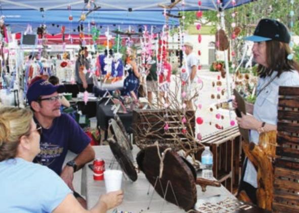 On Saturday, June 5, vendors will fill the heart of the city during Market on Main. Also, families will campout for a new city program on Friday and Saturday, June 4 and 5. File photos