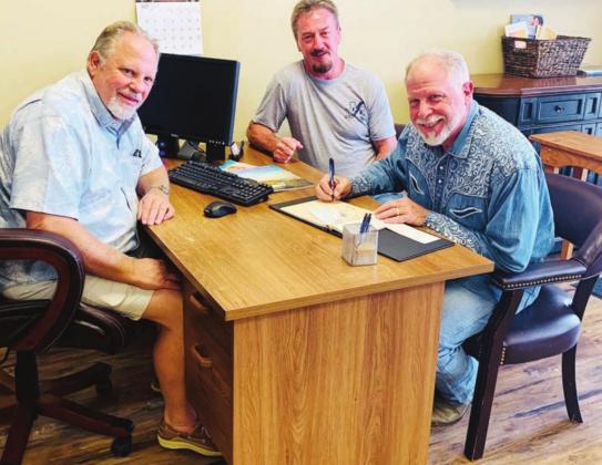 Local businessmen in the finance and trades industries are pooling their resources to replenish the Blue Collar Benevolence Fund to assist residents, struggling because of COVID-19 restrictions, lay-offs and closures. Pictured, from left, are: Tommy Salem, fund founder Brad Jackson and Raymond Whitman. Contributed
