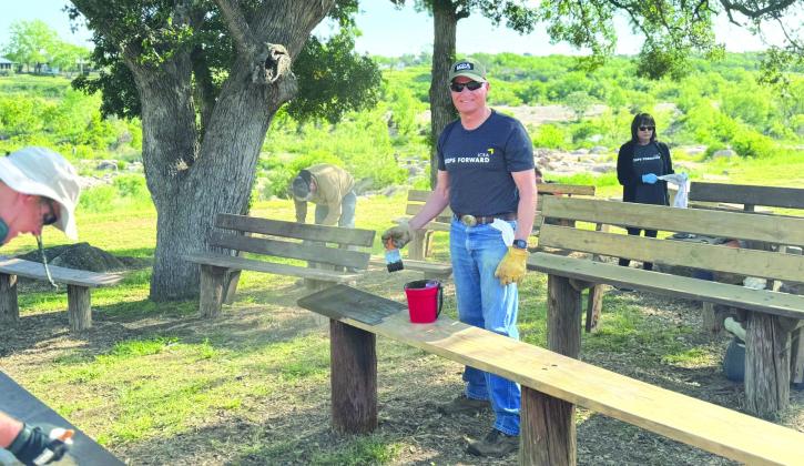 David R. Willmann of Llano County, a member of the LCRA Board of Directors, stained a bench at Grenwelge Park in Llano during LCRA's Steps Forward Day on April 12. During the annual day of service, employees worked on 36 community projects throughout LCRA's service territory.